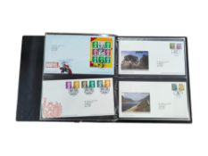4 ALBUMS OF STAMPS