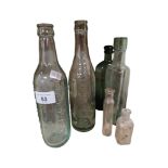 QUANTITY OF GLASS BOTTLES