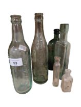 QUANTITY OF GLASS BOTTLES