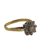18 CARAT GOLD AND DIAMOND CLUSTER RING