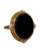 HIGH GRADE GOLD (POSSIBLY 22 CARAT) SET WITH ONYX, SAPPHIRE AND PEARL RING (8.1G)