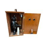 CASED MICROSCOPE AND SLIDES