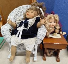 DOLL ON WICKER CHAIR AND DOLL AT SCHOOL DESK