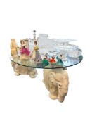 GLASS TOPPED ELEPHANT TABLE ON STAND