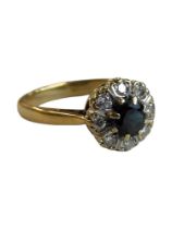 9 CARAT YELLOW GOLD SAPPHIRE AND DIAMOND RING WITH 0.25 CARAT OF DIAMONDS