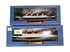 2 BOXED MODEL SHIPS TITANIC AND QUEEN MARY