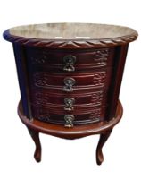 MAHOGANY OVAL SHAPED CHEST OF DRAWERS