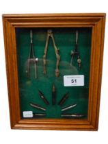 FRAMED SET OF PEN NIBS & COMPASS