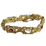 9 CARAT GOLD GARNET AND OPAL BRACELET 17.33G