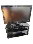 LG TELEVISION WITH BLACK GLASS STAND