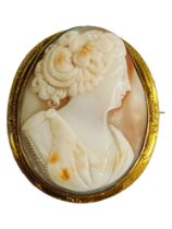 LARGE YELLOW METAL CAMEO BROOCH