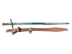 ANTIQUE AFRICAN KASKARA SWORD & SHEATH. THE BLADE WITH 4 MOONFACE STAMPS