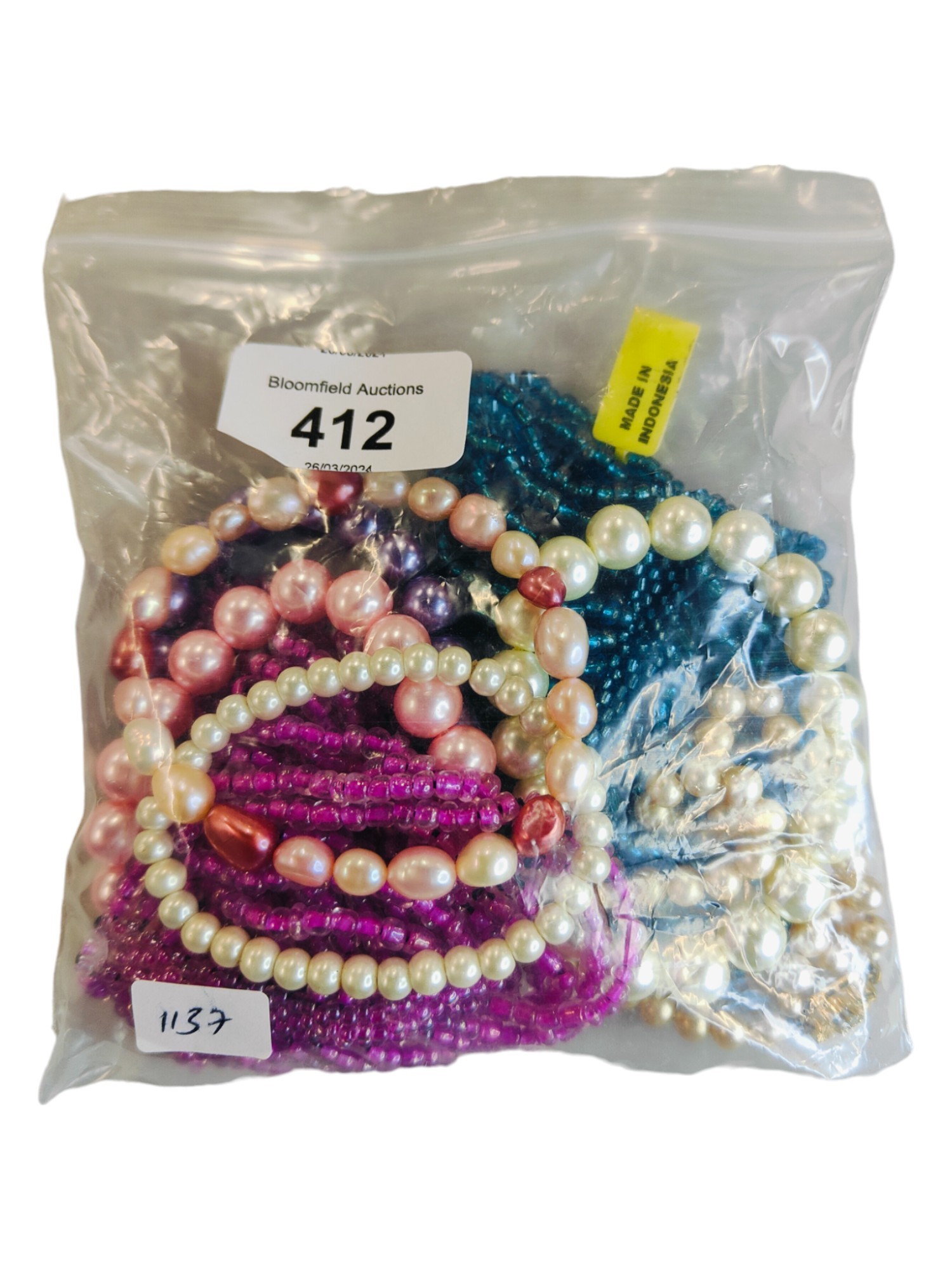 BAG OF BEADED BRACELETS & PEARL BRACELETS