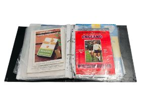 LARGE FOLDER OF NORTHERN IRELAND AWAY PROGRAMMES