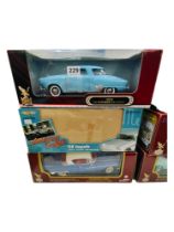 3 BOXED LARGER SCALE MODEL CARS