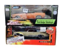 2 BOXED LARGE SCALE MODELS FROM 'THE FAST AND THE FURIOUS' MOVIE FRANCHISE