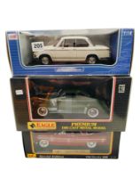 3 BOXED LARGER SCALE MODEL CARS