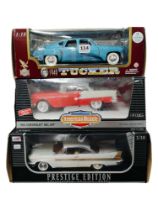 3 BOXED LARGER SCALE MODEL CARS