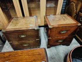 PAIR OF 2 DRAWER LEATHER TOPPED BEDSIDE LOCKERS, BRASS BOUND CAMPAIGN STYLE