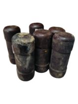 COLLECTION OF OLD RUBBER BATON ROUNDS