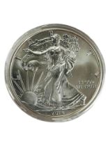 1 OZ FINE SILVER ONE DOLLAR 2014