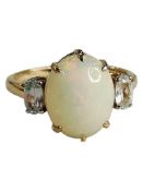 9 CARAT GOLD LARGE OPAL AND DIAMOND RING