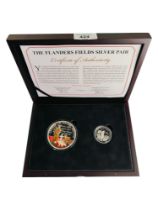 THE FLANDERS FIELDS SILVER PAIR OF COINS WITH CERTIFICATE IN BOX