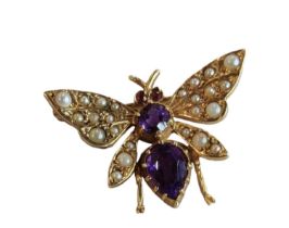 9 CARAT GOLD AMETHYST, RUBY AND SEED PEARL BUTTERFLY BROOCH