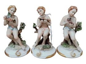 3 CAPODIMONTE CHERUB PORCELAIN FIGURES