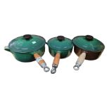 A SET OF LE CRUESET POTS IN VERY GOOD CONDITION