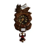 MINIATURE BLACKFOREST NOVELTY CLOCK & SWINGING FIGURES PENDULUM