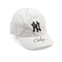 A BARACK OBAMA SIGNED YANKEES BASEBALL CAP. White canvas baseball cap by Hat Man of New York, w...