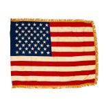 A KENNEDY ADMINISTRATION WEST WING FLAG FROM THE ESTATE OF DAVE POWERS. Machine-stitched rayon U...