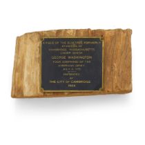 A FRAGMENT OF THE 'WASHINGTON ELM.' Wooden fragment with bronze plaque affixed reading: 'A piece...