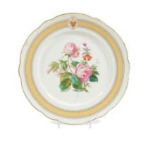 A ULYSSES S. GRANT PRESIDENTIAL SERVICE DINNER PLATE. A porcelain plate with gilt rim, cream, gi...