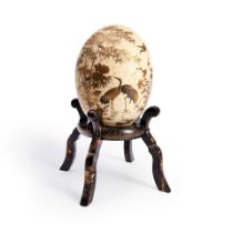 A LACQUER AND SHIBAYAMA INLAID OSTRICH EGG
