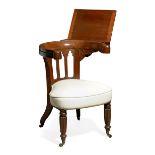 A GEORGE IV CARVED MAHOGANY READING CHAIRIn the manner of Morgan & Sanders, circa 1825