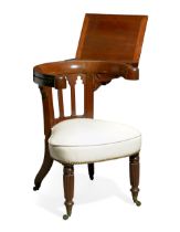 A GEORGE IV CARVED MAHOGANY READING CHAIRIn the manner of Morgan & Sanders, circa 1825