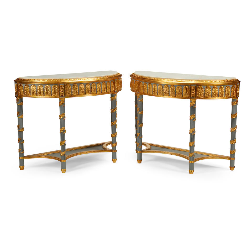 A PAIR OF NEOCLASSICAL STYLE MARBLE TOP GILT AND PAINTED WOOD CONSOLES