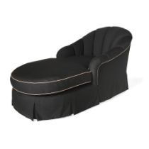 A BLACK UPHOLSTERED CHAISE LOUNGE