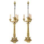 A PAIR OF EMPIRE STYLE GILT BRONZE FOUR-LIGHT CANDELABRA