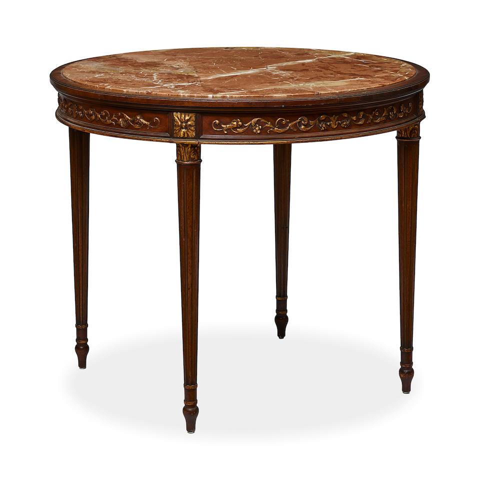 A LOUIS XVI STYLE MARBLE INSET PARCEL GILT CARVED MAHOGANY CIRCULAR CENTER TABLE