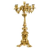 A ROCOCO STYLE GILT BRONZE SEVEN-LIGHT CANDELABRAEarly 20th century