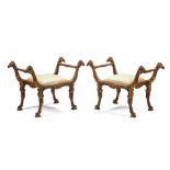 A PAIR OF CONTINENTAL ROCOCO STYLE CARVED PARCEL GILT BENCHES