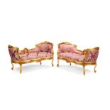 A PAIR OF LOUIS XV STYLE GILTWOOD SETTEES