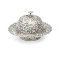 AN AMERICAN COIN SILVER CHASSED AND REPOUSSÉ COVERED BUTTER DISH by A. E. Warner, Baltimore...