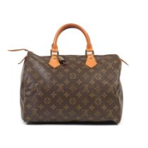 Louis Vuitton: a Monogram Speedy 30 1988 (includes padlock and key)