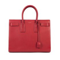 Saint Laurent: a Red Calfskin Medium Sac de Jour (includes padlock, keys, cloche and copy of ori...