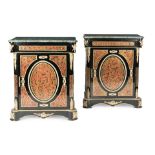 A pair of ebonised gilt-metal mounted, cut-brass inlaid and simulated tortoiseshell 'Boulle' sty...