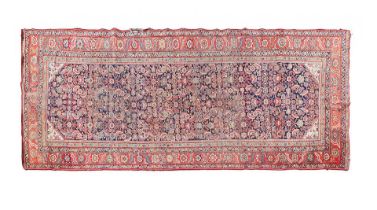A Feraghan rug Iran, early 20th century 424cm x 163cm, (166 15/16in x 64 3/16in)